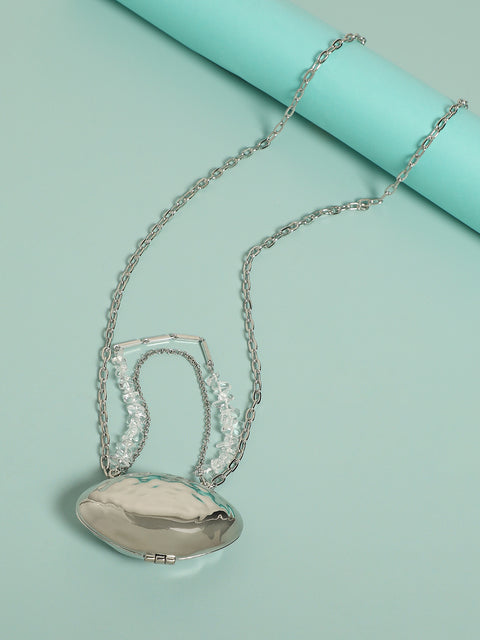 Metallic Magic: Enhancing Style with a Bodychain and Mini Purse