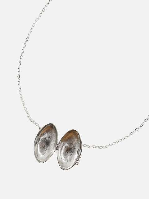 Metallic Magic: Enhancing Style with a Bodychain and Mini Purse