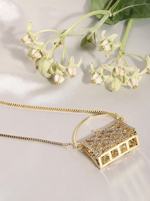 The Golden Duo: Unleashing Glamour with a Metallic Bodychain and Mini Purse