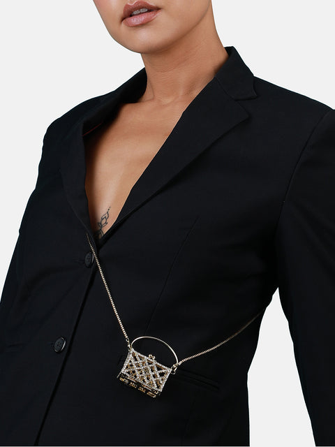 The Golden Duo: Unleashing Glamour with a Metallic Bodychain and Mini Purse