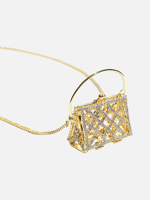 The Golden Duo: Unleashing Glamour with a Metallic Bodychain and Mini Purse
