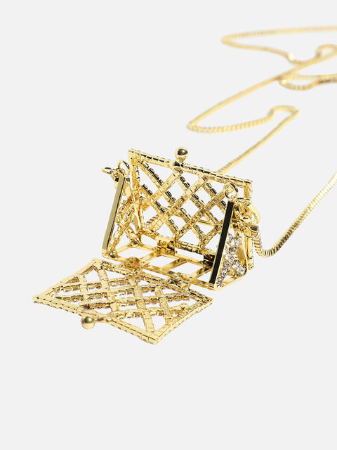 The Golden Duo: Unleashing Glamour with a Metallic Bodychain and Mini Purse