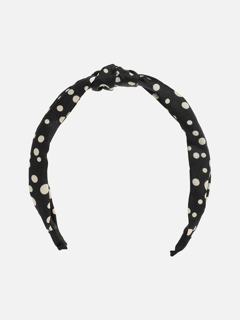 Glittering Accessory: The Embellished Hairband of Glamour